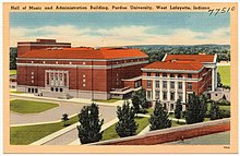 A postcard showing two adjoining brick buildings, labeled Hall of Music and Administration Building