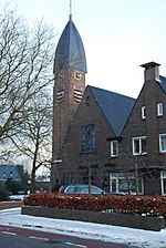 Paraboolvormige spits op de Pelgrimskerk.