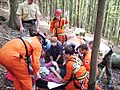 Image 24Mountain rescue team members and other services attend to a casualty in Freiburg Germany. (from Mountain rescue)