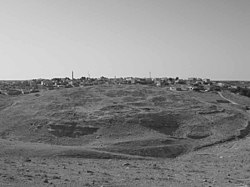 Ancient Dhiban with modern settlement in the background, looking south