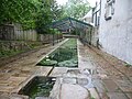 Les lavoirs devant la fontaine.