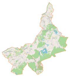 Mapa konturowa powiatu tarnobrzeskiego, na dole znajduje się punkt z opisem „Dęba-Osiedle”