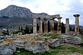 Image 18Ruins of the Temple of Apollo within the polis of Ancient Corinth, built c. 540 BC, with the Acrocorinth (the city's acropolis) seen in the background (from Archaic Greece)