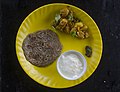 Buckwheat bread (roti) with potato curry and sour curd, Sikkim, India