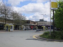 Outdoor bus station, with covered waiting areas