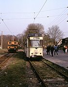 Straßenbahntriebwagen Tw 05 und Lok 15 an der Endstelle der Strausberger Eisenbahn, 1991