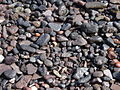 Gravel (largest fragment in this photo is about 4 cm) from Thirasia, Santorini, Greece.