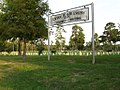 El lletreru de la entrada del Campusantu Capitán Joe Byrd, un campusantu pa prisioneros, n'Huntsville, Texas.