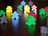 Meeples used in Carcassonne.