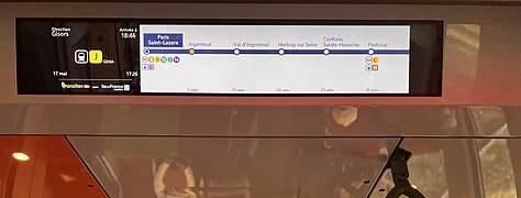 Écran d'information voyageurs indiquant la desserte du train.