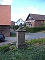 Bildstock westlich der Kirche an der Bruchsteinmauer