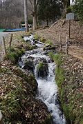 The Suiga River flowing beside the honden