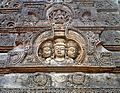 A relief of Trimurti on a dome at Sri Mukhalingam temple complex