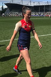 Pearce walking from the field