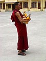 Gyuto monk carrying images