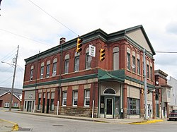 Building at the intersection of Broad Street (PA Route 28) and Wood Street (PA Route 66) looking east in downtown New Bethlehem[1]