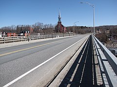 Route 243 shares its itinerary with Routes 116 and 143 on Frederick-Coburn Bridge in Richmond.