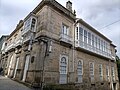 Side facade of the Bernardo López mansion, dating from the 19th century, with its emblematic chimney and galleries.