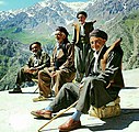 A_group_of_Kurdish_men_with_traditional_clothing_at_Hawraman,_Kurdistan.