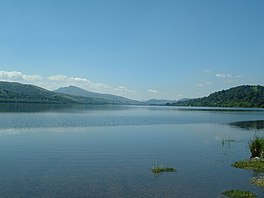 A large lake surrounded by hills