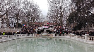 A speech being delivered from the stairs of the Jardin Darcy, in Dijon (Côte-d'Or, Burgundy, France) for the global climate strike on 15 March 2019