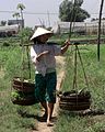 Chinese landarbeidster met een juk