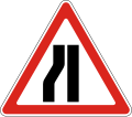 Road narrows on the left