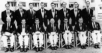 Die Rudermannschaft von 1952, stehend (v. l. n. r.): Chapman, Anderson, Rogers, Greenwood, Pain, Finlay, Middleton, Williamson; sitzend (v. l. n. r.): Palmer, Cayzer, Riley, Berkery, Wood, Chessell, Tinning