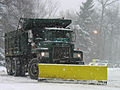 A snowplow mounted on a dump truck in Washington, DC