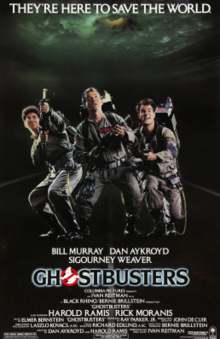 The poster for Ghostbusters (1984), featuring actors Harold Ramis, Bill Murray, and Dan Aykroyd in characters looking above.