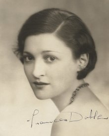 black and white portrait of young white woman with dark hair in semi-profile