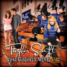 Cover artwork of "You Belong with Me", featuring Swift in a marching band