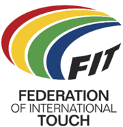 Logo showing a multicolored, stylized, oval-shaped, football. Four approximately concentric crescent shapes (red, yellow, green and blue on a white or light-colored background) are used to form the top and left parts of the ball. The three black capital letters F, I and T (all slightly curved and on the same white or light-colored background) are used for the bottom-right of the ball. The words "Federation of International Touch" (split over three lines of text) are positioned below the stylized ball.
