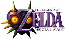 Zelda est inscrit en lettres violettes. Les mentions The Legend of Zelda et Majora's Mask figurent en tout petit en dessus et en dessous. Sur la gauche en arrière-plan, figure une sorte de masque violet en forme de cœur, équipé de pointes, avec des yeux rouges et jaunes.