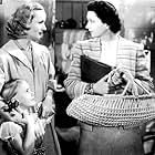 Carole Lombard, Kay Francis, and Peggy Ann Garner in In Name Only (1939)