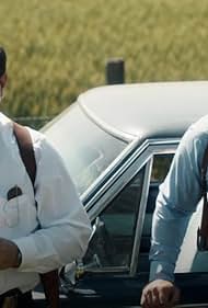 Patrick Gallagher and Ty Olsson in Fortunate Son (2020)