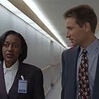 David Duchovny and CCH Pounder in The X Files (1993)