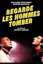 Regarde les hommes tomber