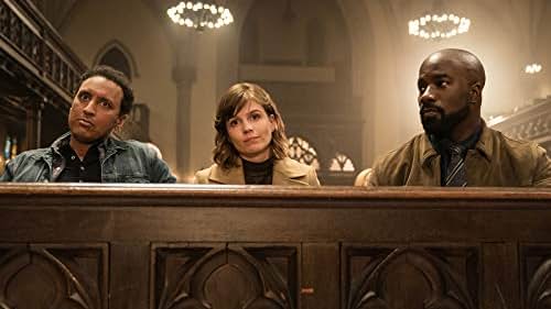 Aasif Mandvi, Katja Herbers, and Mike Colter in Book 27 (2020)