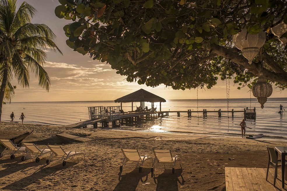 Pôr do sol visto do Xbalanque Resort em Roatán, em Honduras The New York Times — Foto: O Globo