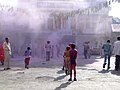 Gulal clouds as children play Holi at Pushkar, Rajasthan