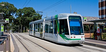 C class tram number 3017 at the St Vincent's Plaza stop in East Melbourne