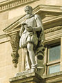 Statue de l'écrivain caennais François de Malherbe, œuvre du sculpteur Jean Jules Allasseur, située sur la façade de l'aile Turgot (du côté de la cours Napoléon) du Musée du Louvre.