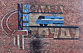 Soviet mural inlay: Glory to Labour. In a Soviet railway station.