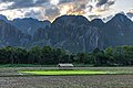 16 Square plot of a green paddy field, hut and karst mountains under colorful clouds at sunset, Vang Vieng, Laos uploaded by Basile Morin, nominated by Basile Morin,  10,  1,  0