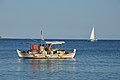 Ships and boats, old and new, small and big, near and far, in the Aegean Sea.