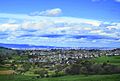 The village of Neilston, with Glasgow in the distance