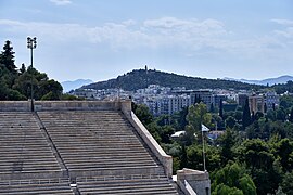 The Panathenaic Stadium and Philopappos Hill from the Hill of Ardettus on July 21, 2019.jpg