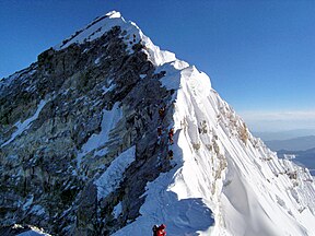 Looking up along the southern ridgeline, the face of the Hillary Step is visible.