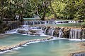 "Kuang_Si_Falls_and_its_emerald_water_pools_in_Luang_Prabang_province_Laos.jpg" by User:Basile Morin